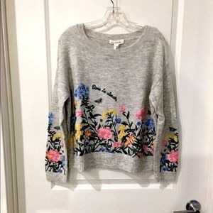 Floral and gray oversized cropped sweater.